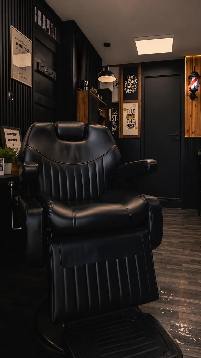 Interior de Gianpiert Barbería & Coffee con silla principal y ambiente premium